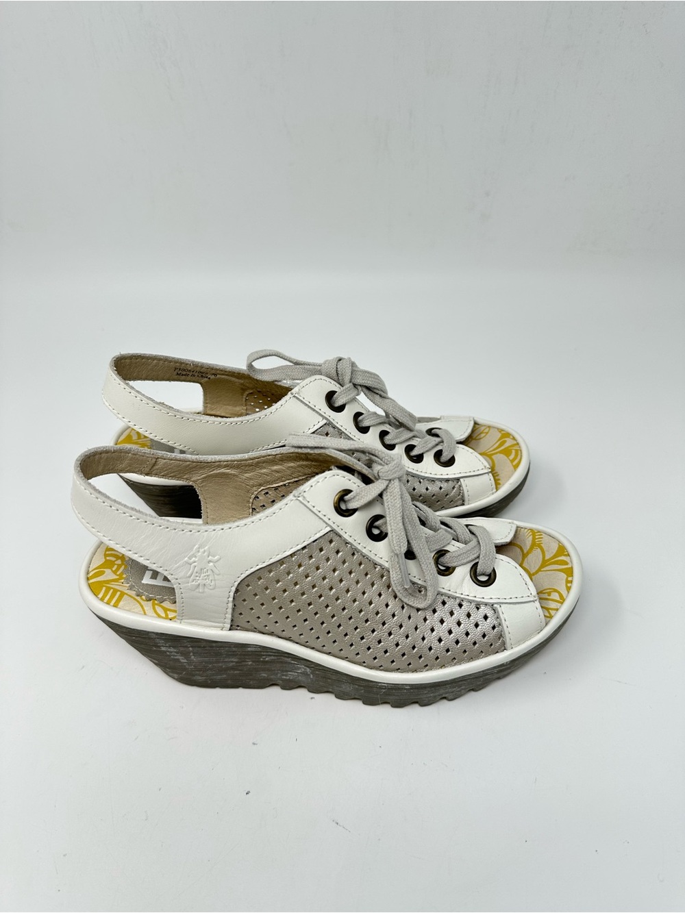 Fly London Yuta Wedge Sandals in a silver Perforated leather SZ 36